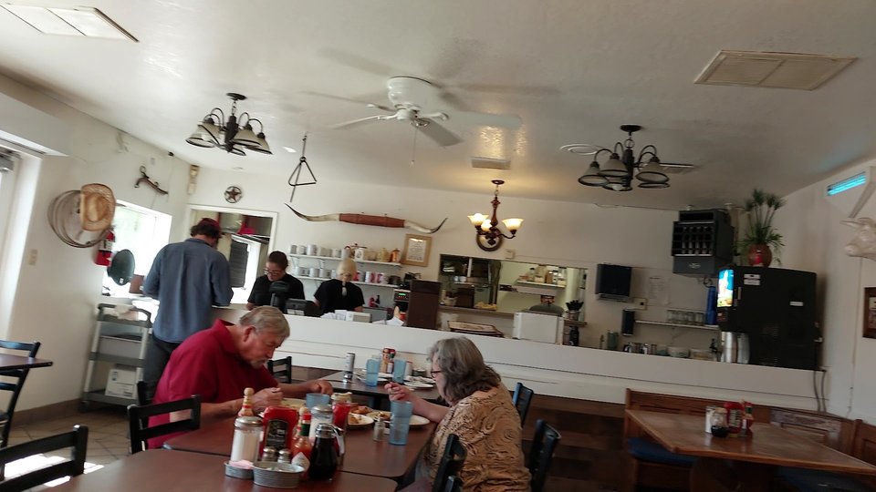 Cozy Western cafe tables and booth seating